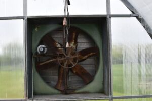 Installation of a new exhaust fan belt. | Dr. W. Garrett Owen, The Ohio State University