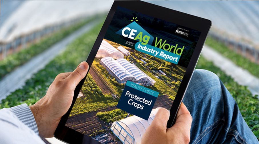 Grower holding an iPad with the CEAg World Industry Report: Protected Crops on the screen,
