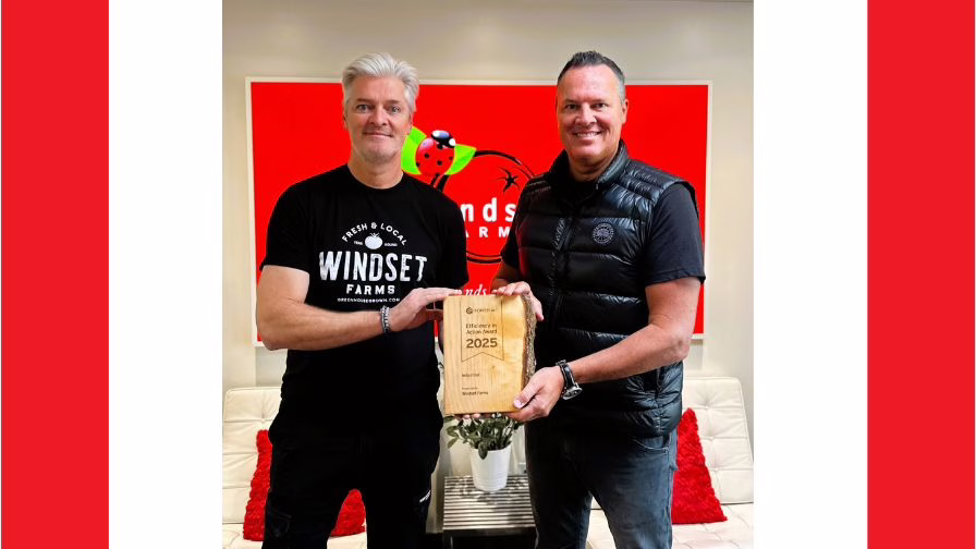 John and Steve of Windset Farms posing with the 2025 FortisBC 2025 Efficiency in Action Award.